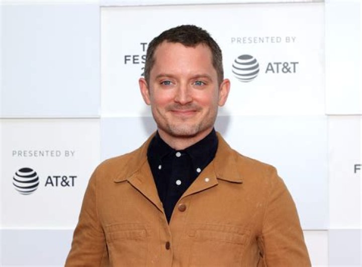 
Elijah Wood Criticizes AMC Theaters’ Ticket Price Hikes, Saying They “Penalize People for Lower Income” 