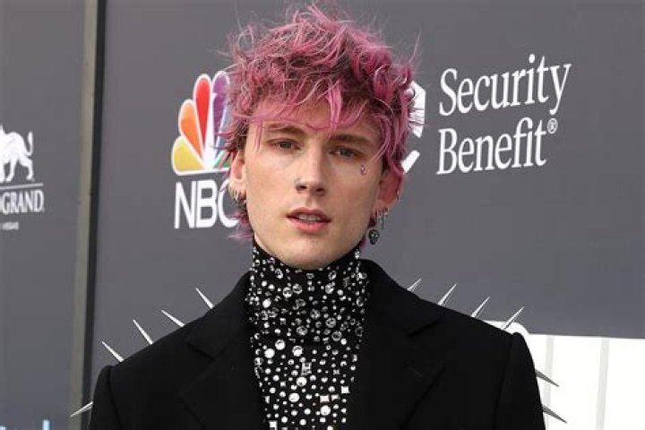
Machine Gun Kelly Says He’s ‘Sick’ of People Thinking He ‘Departed’ Hip-Hop to Make Pop-Punk Music 