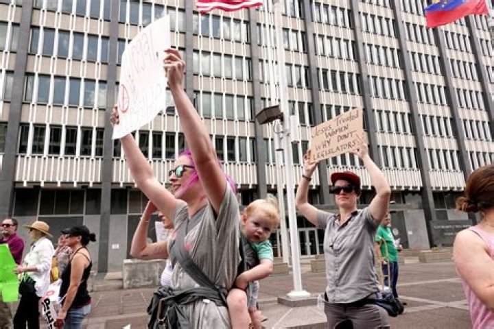 
Minnesota Lynx vs New York Liberty Game: Pro-Choice Activists March TOPLESS 