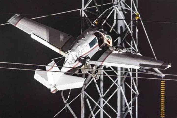 
Pilot on 911 Call from Dangling Plane that Crashed into Power Lines: ‘If We Get Some Wind … We’re Goners’ 