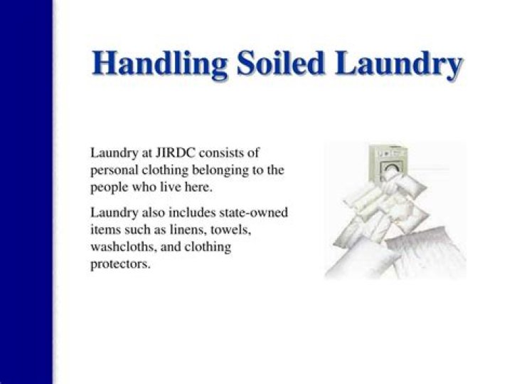 Where should laundered linens be kept?