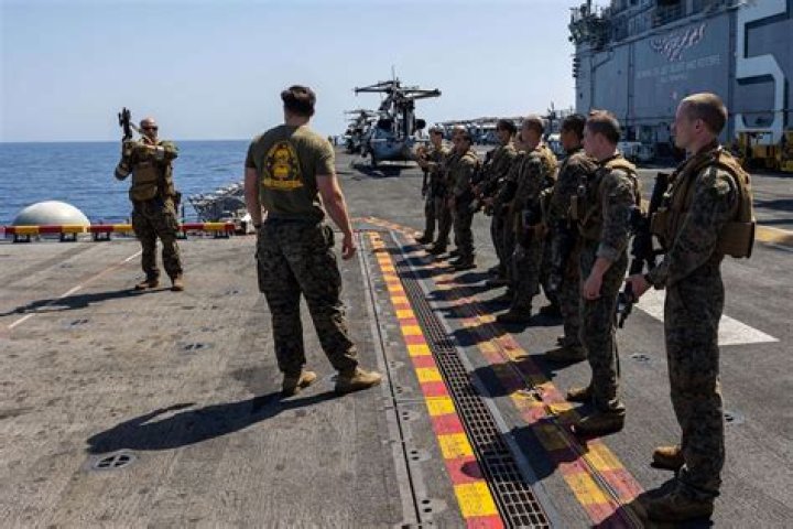 Why are marines stationed on navy ships?